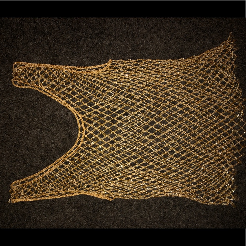 Gold beaded tank top.